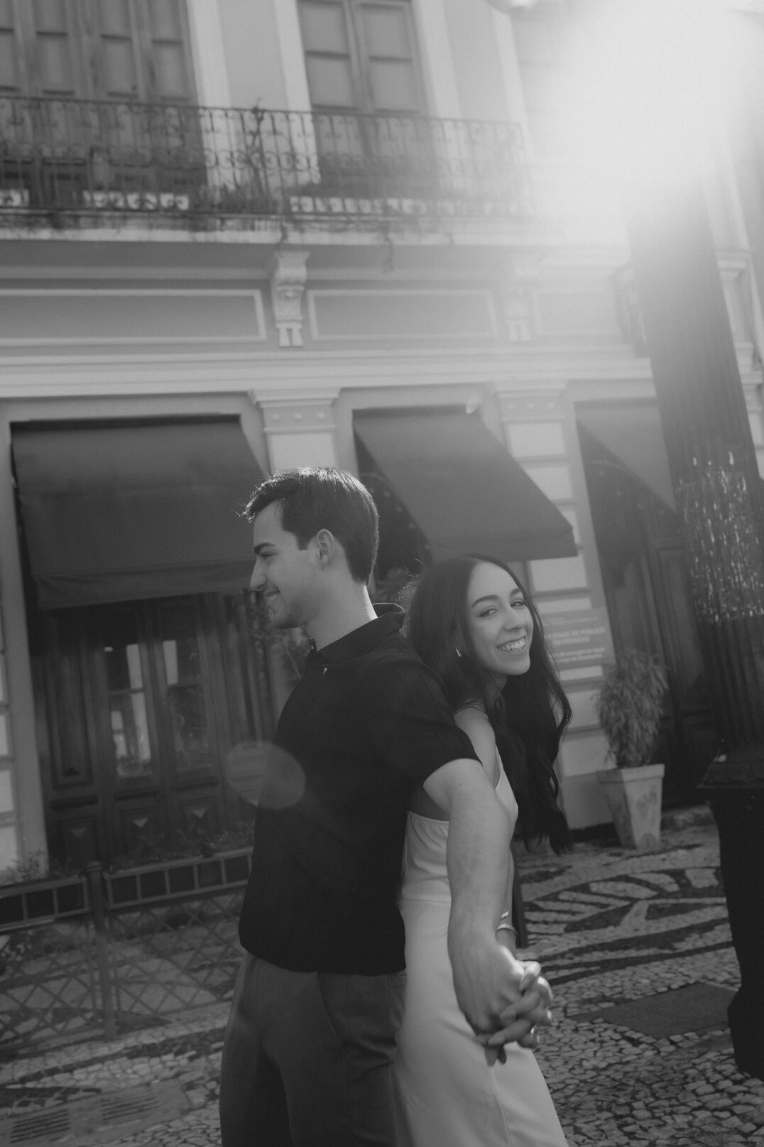 couple holding hands outdoors