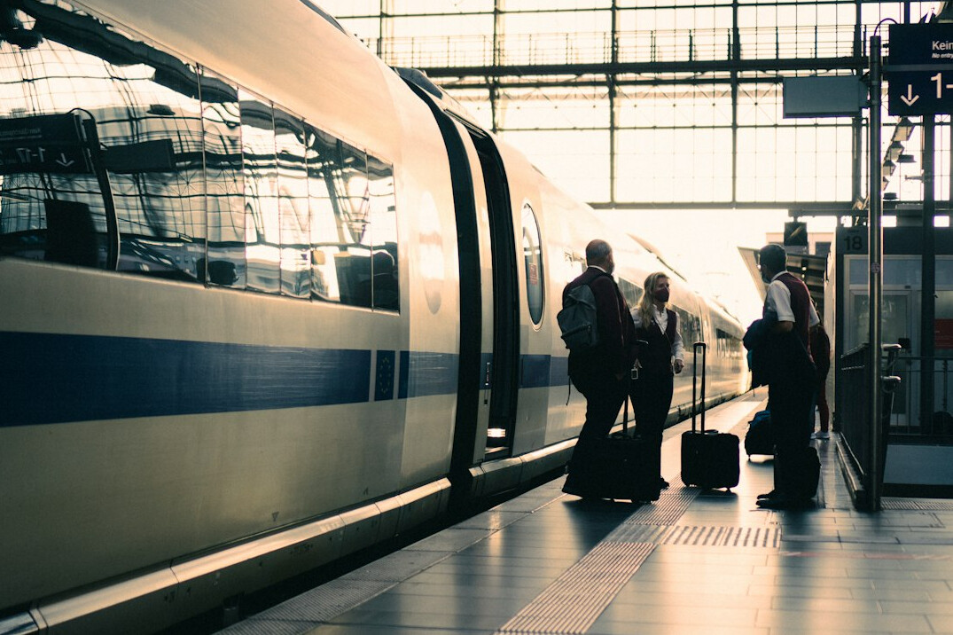person traveling by train in europe